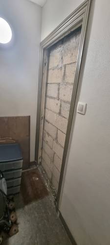 Démolition d'un murage fenêtre et d'une porte murée